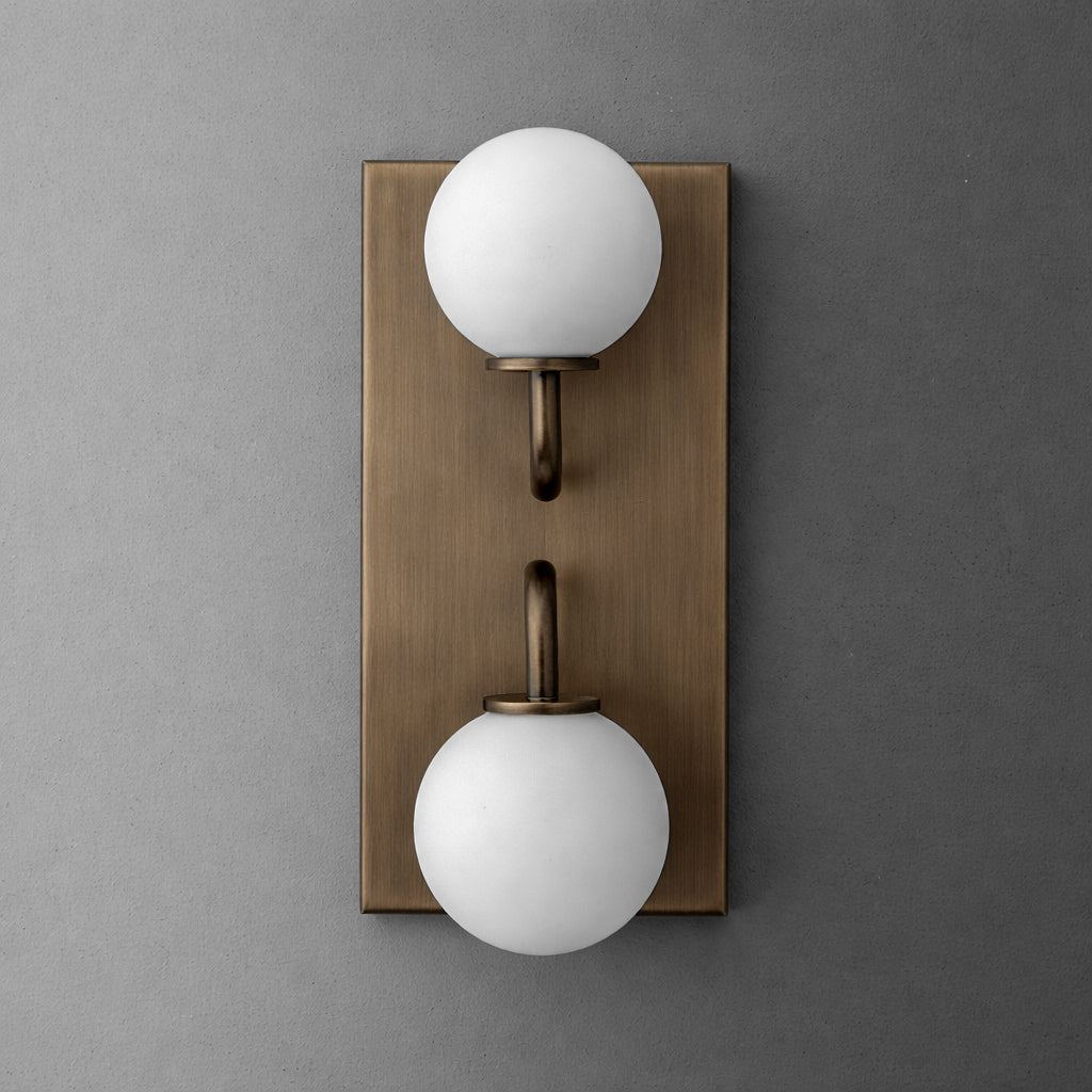 Two-bulb wall sconce with a rectangular bronze backplate and round frosted white glass shades. - SCONCE MODEL NO. 9868