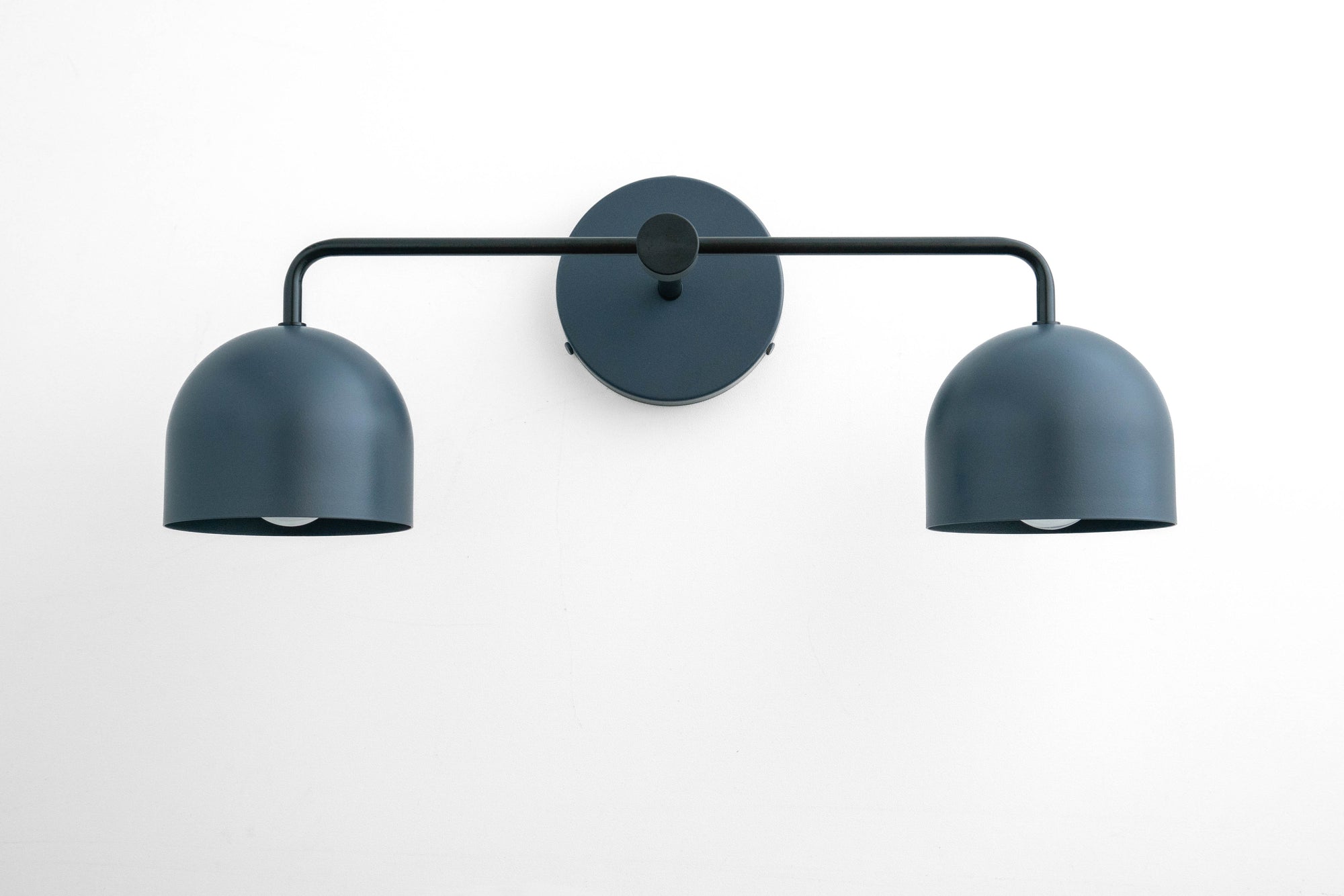 Matte dark blue metal vanity light with two dome-shaped shades and a circular wall mount. - VANITY LIGHT MODEL NO. 2082