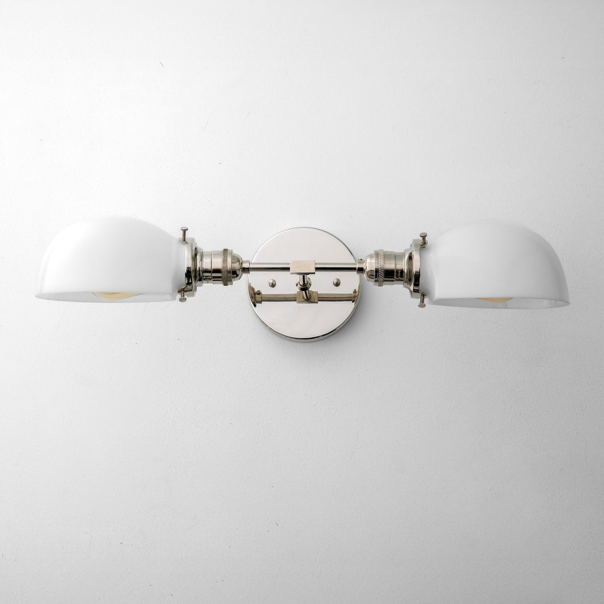 Mid-century modern 2-bulb vanity light with polished nickel finish and white dome-shaped glass shades. - VANITY LIGHT MODEL NO. 1734