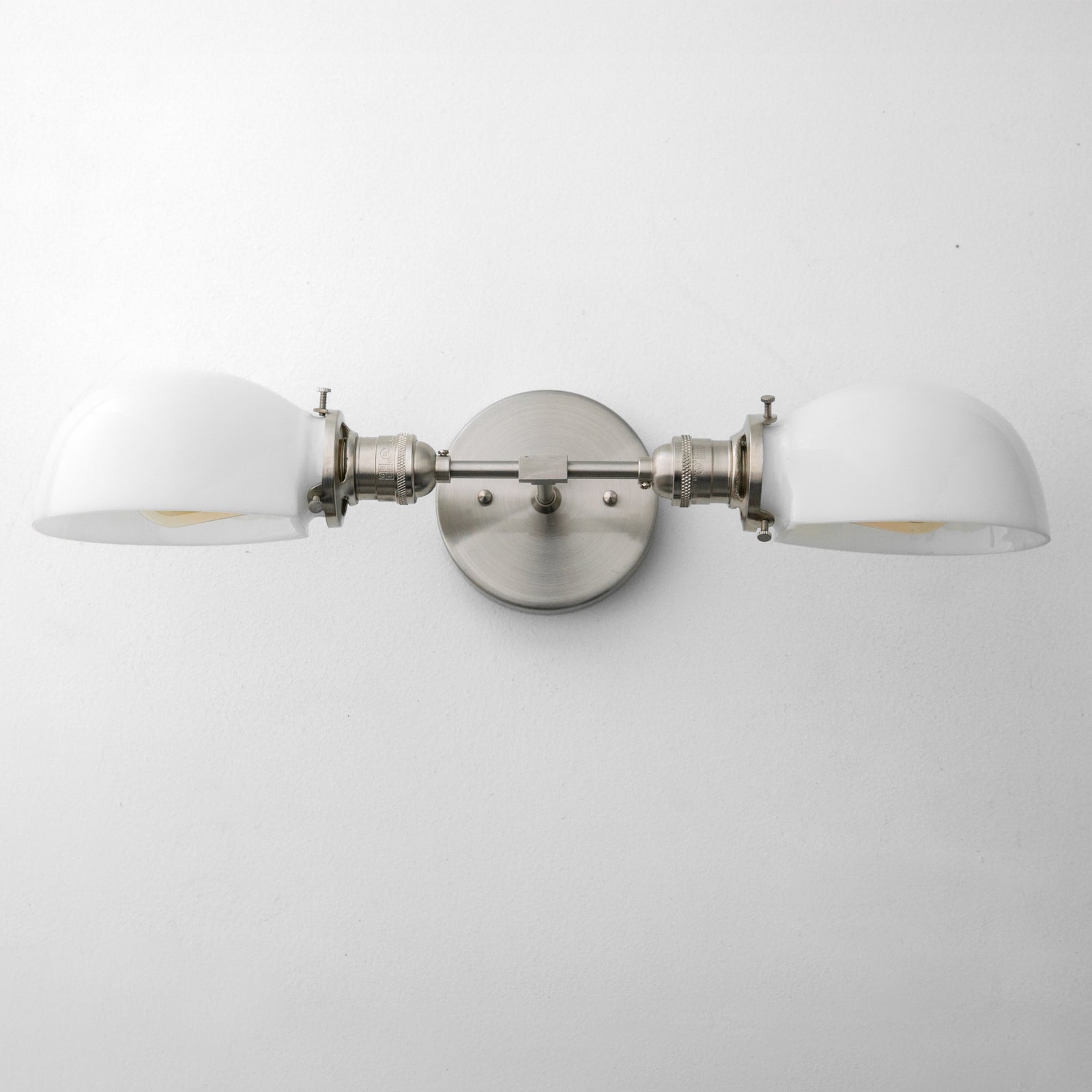 Mid-century modern vanity light with two white half-dome glass shades and brushed nickel finish. - VANITY LIGHT MODEL NO. 1734