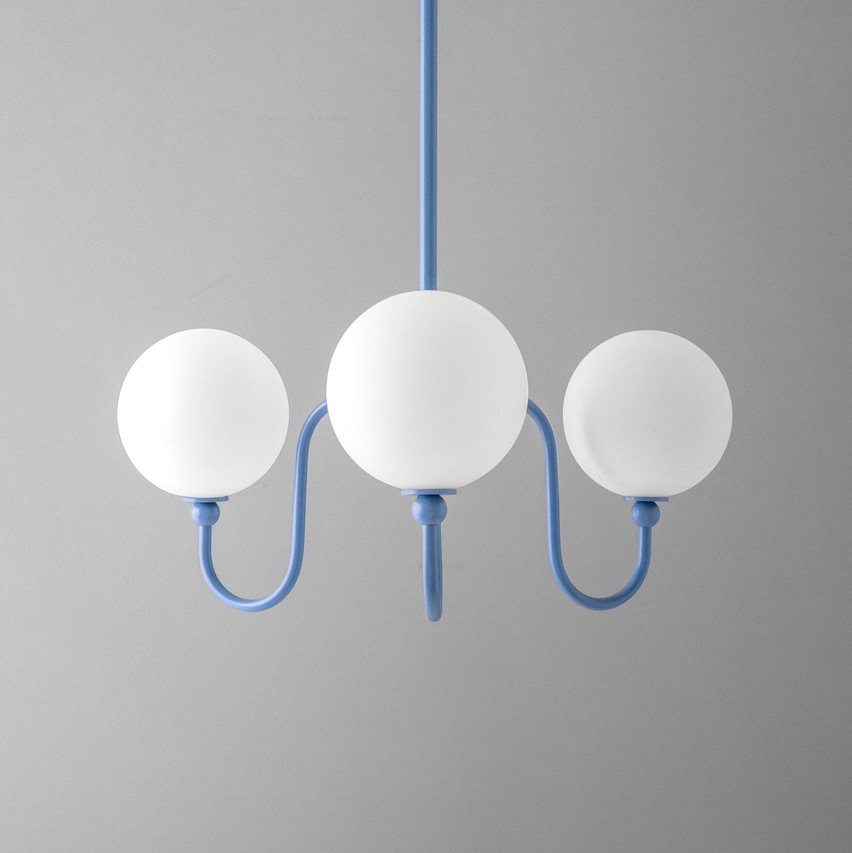 Minimalist chandelier with three white globe lights and periwinkle blue metal frame. - CHANDELIER MODEL NO. 0678