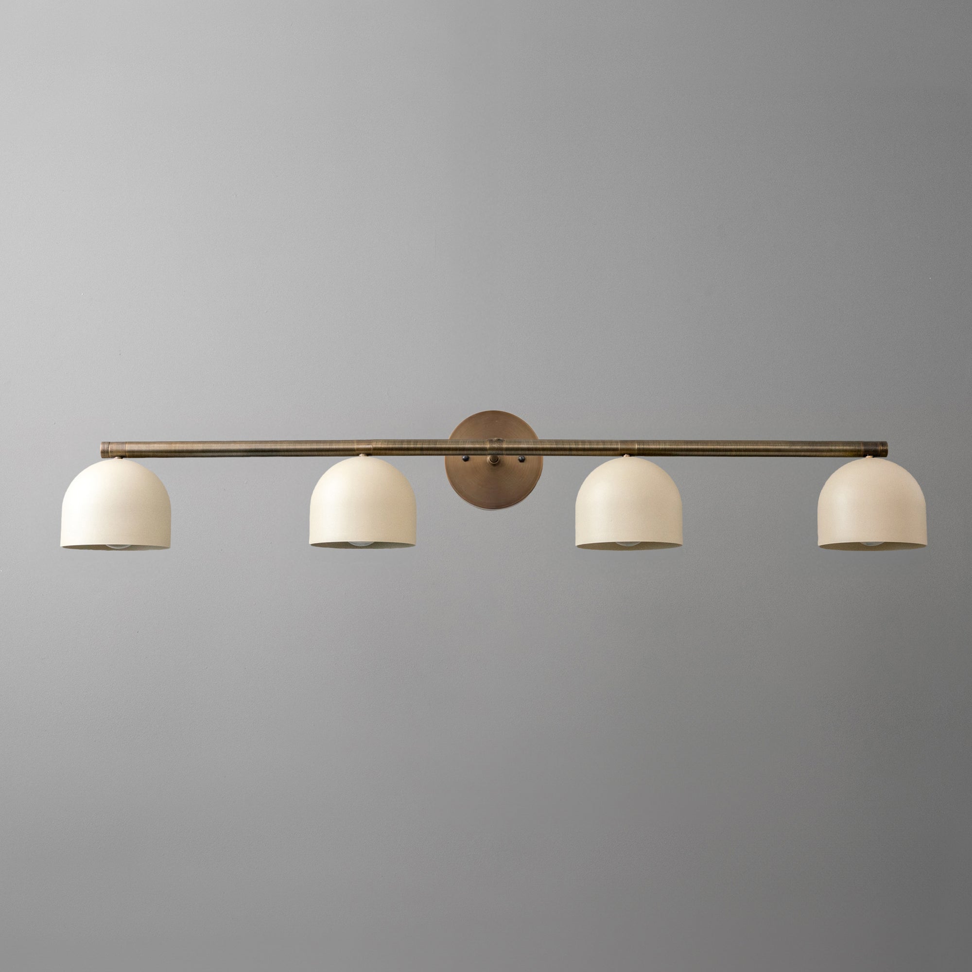 Four-bulb vanity light with brushed brass finish and matte white deep dome shades. - VANITY MODEL NO. 6448