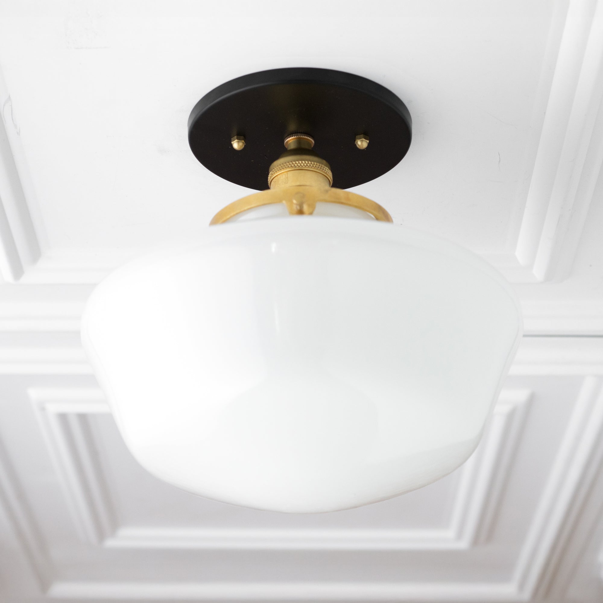 Mid-century modern semi-flush ceiling light with white glass globe and black and brass fixture. - CEILING LIGHT MODEL NO. 5754