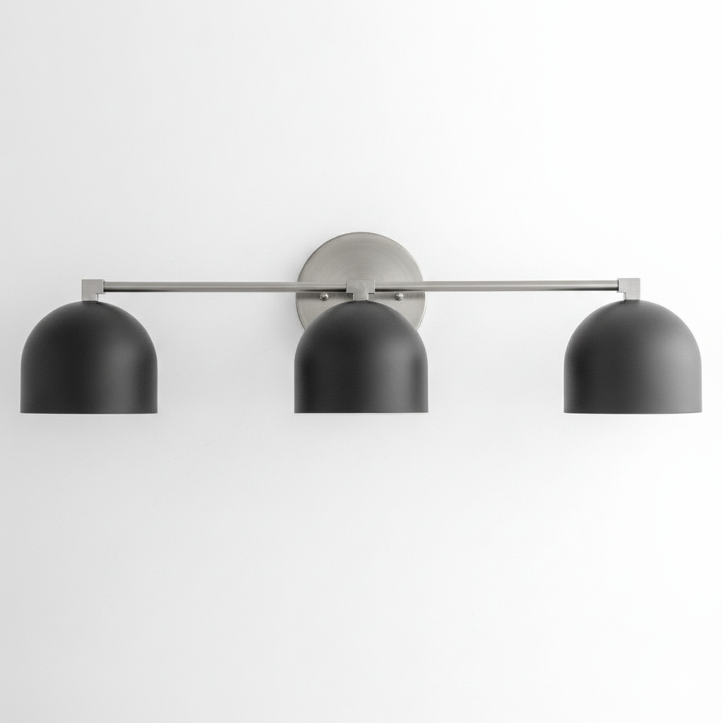 Three-bulb vanity light with matte black dome shades and brushed nickel horizontal bar. - VANITY LIGHT MODEL NO. 7565