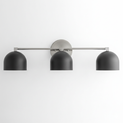 Three-bulb vanity light with matte black dome shades and brushed nickel horizontal bar. - VANITY LIGHT MODEL NO. 7565