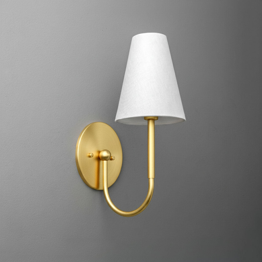 Antique brass wall sconce with curved arm and white tapered fabric shade. - SCONCE MODEL NO. 4594