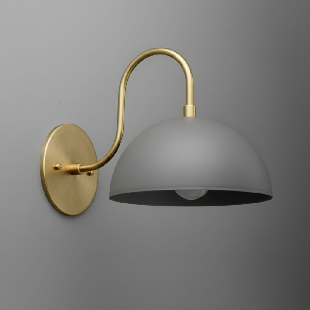 Wall sconce with matte gray dome shade and curved antique brass arm and base plate. - SCONCE MODEL NO. 9092