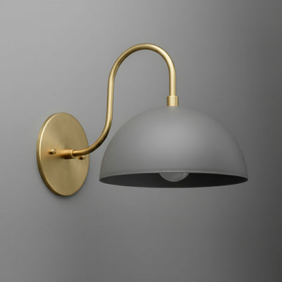 Wall sconce with matte gray dome shade and curved antique brass arm and base plate. - SCONCE MODEL NO. 9092