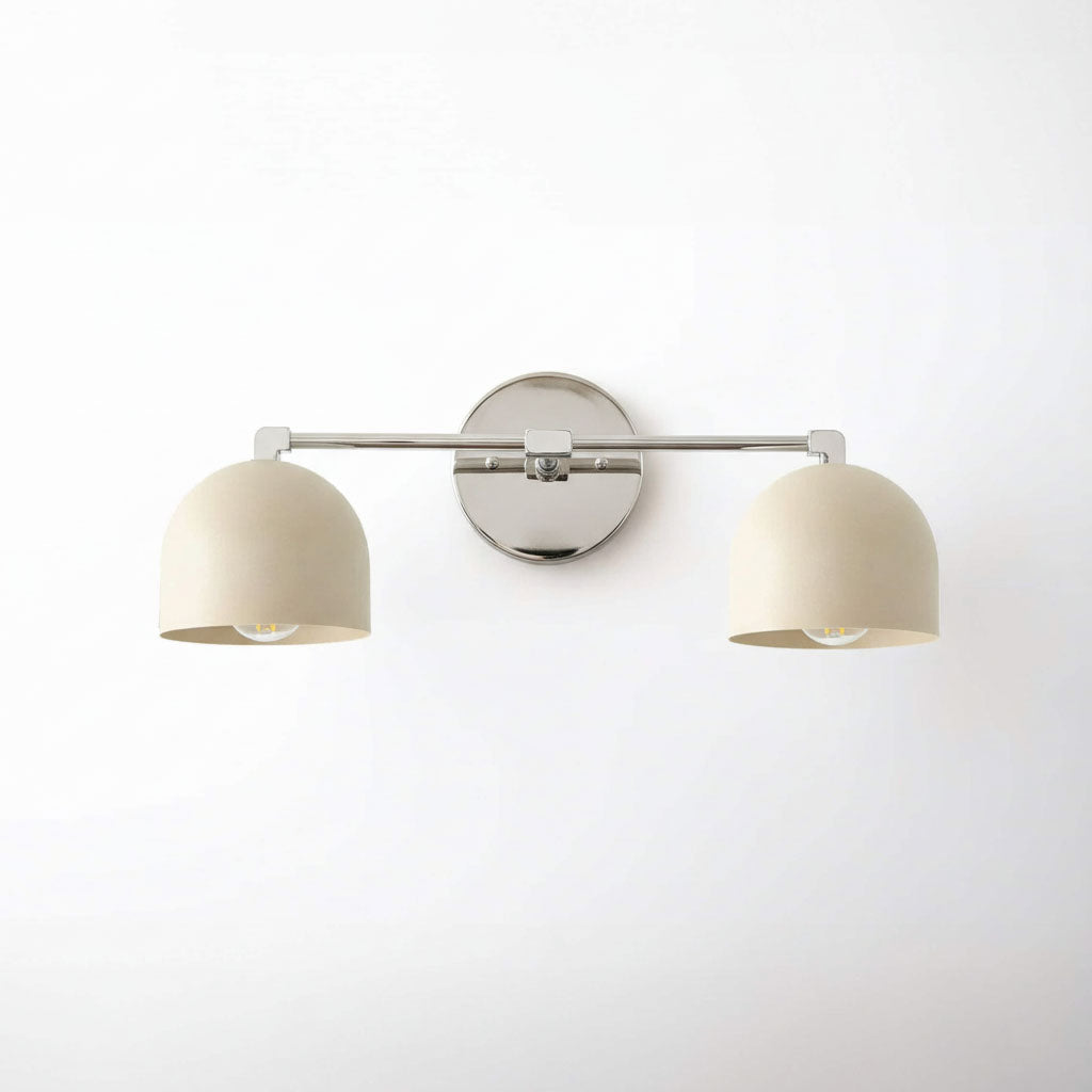 Two-light wall vanity fixture with cream dome shades and polished nickel finish mount. - VANITY LIGHT MODEL NO. 0698