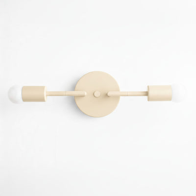 Mid-century modern cream-colored 2-bulb vanity light with bare bulbs and round wall mount. - VANITY LIGHT MODEL NO. 1938