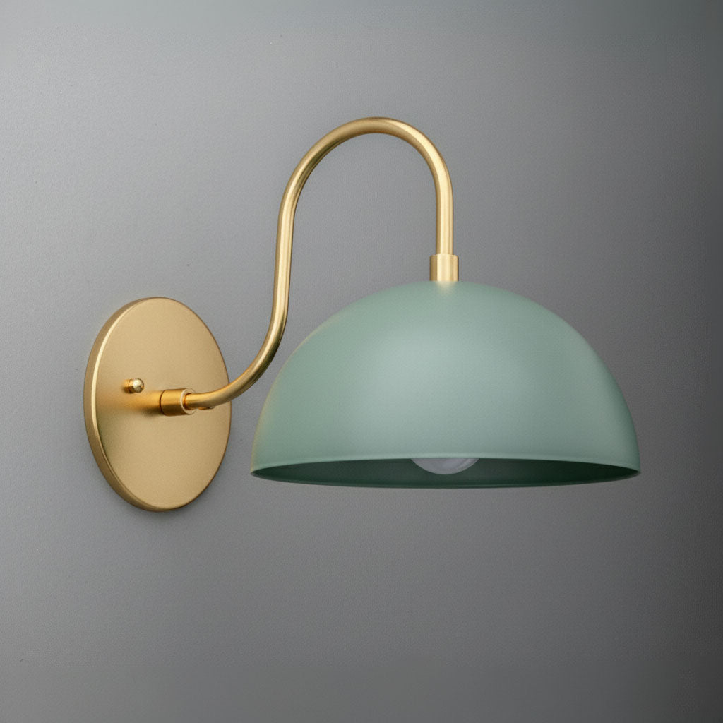 Wall sconce with matte green dome shade and curved antique brass arm and base plate. - SCONCE MODEL NO. 9092