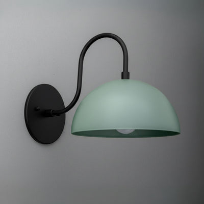 Matte black metal wall sconce with a curved arm and a soft periwinkle dome-shaped shade. - SCONCE MODEL NO. 9092