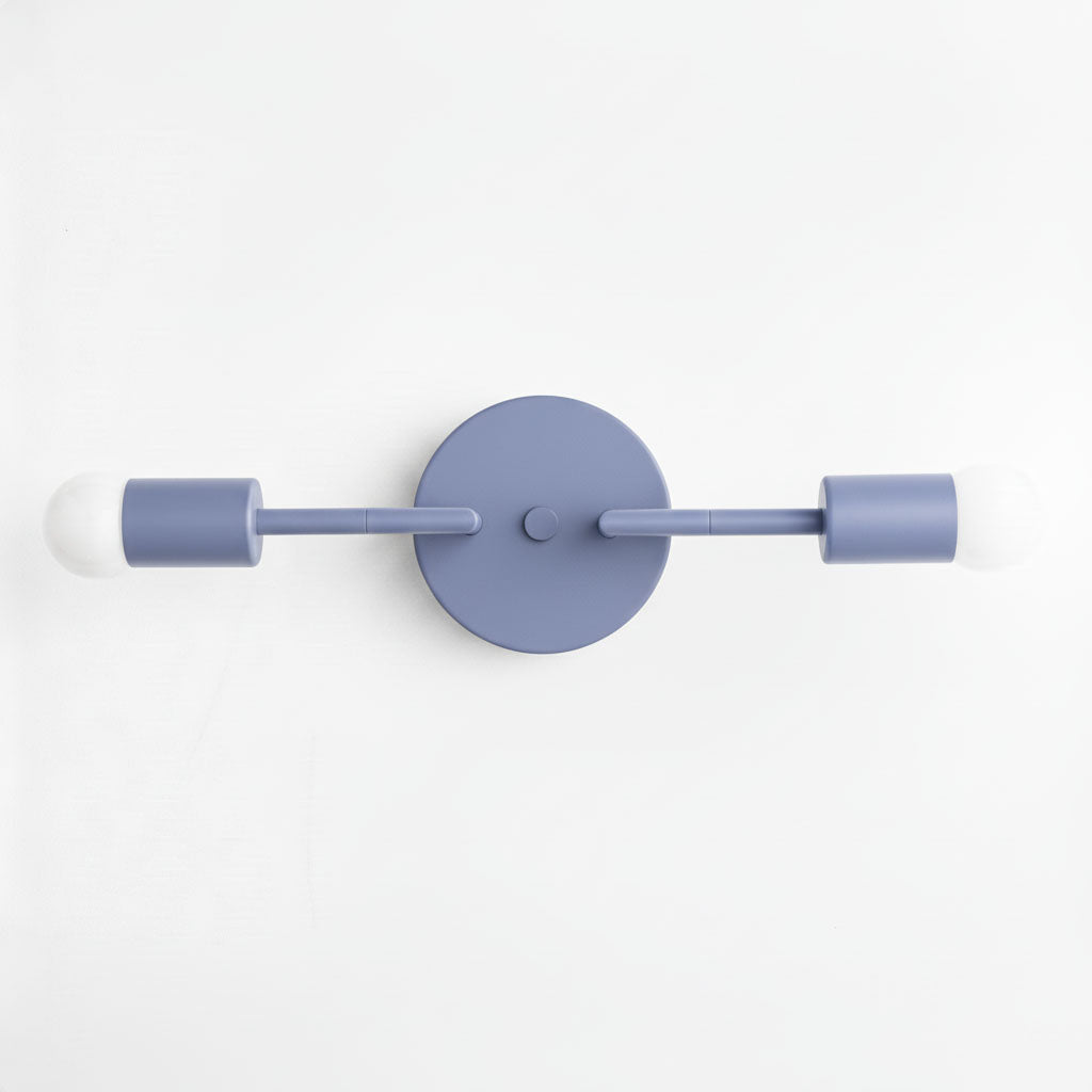 Mid-century modern style vanity light in periwinkle with two exposed bulbs and round wall mount. - VANITY LIGHT MODEL NO. 1938