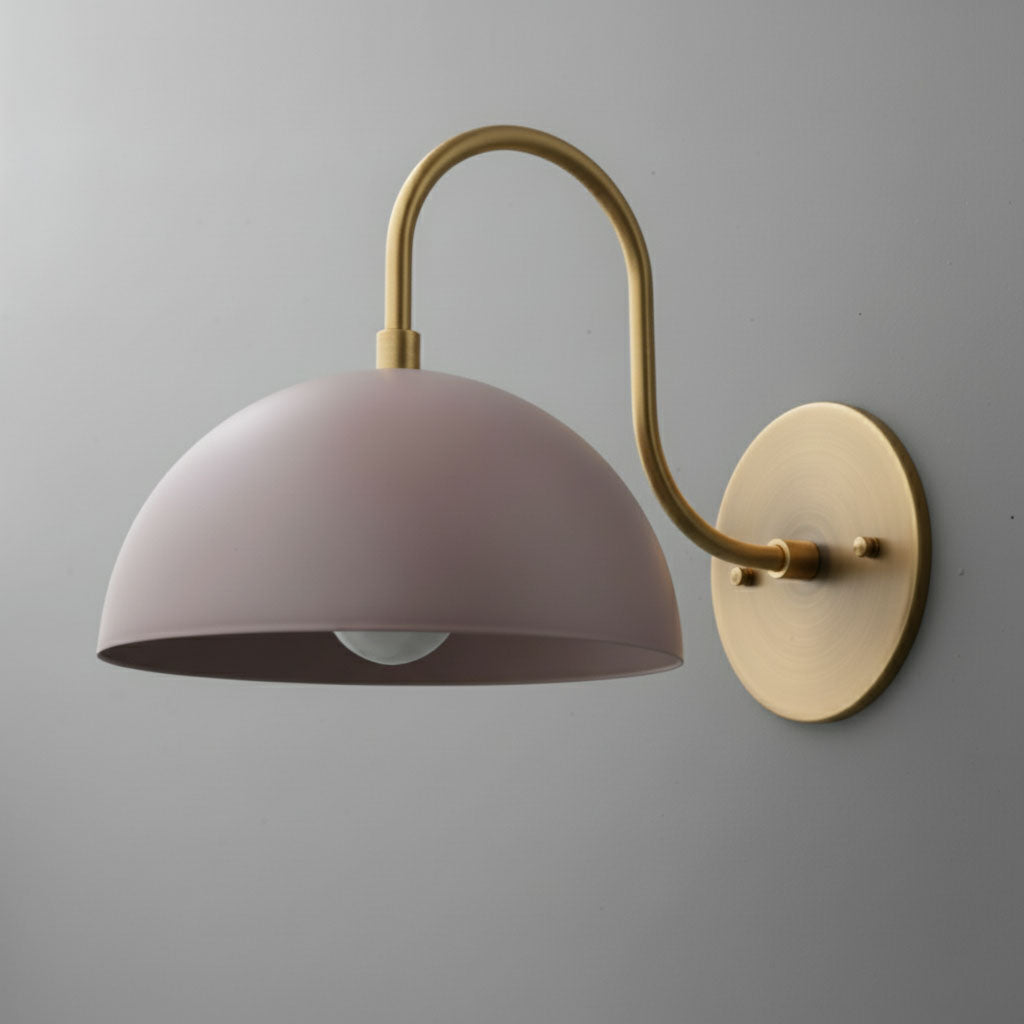 Wall-mounted sconce with matte mauve dome shade and antique brass curved arm and baseplate. - SCONCE MODEL NO. 9092