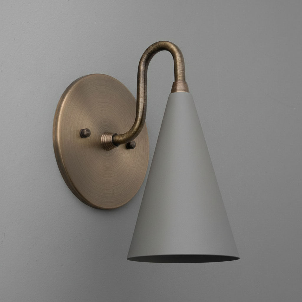 Antique brass sconce with matte gray conical shade mounted on a round wall plate. - Sconce Model No. 2900