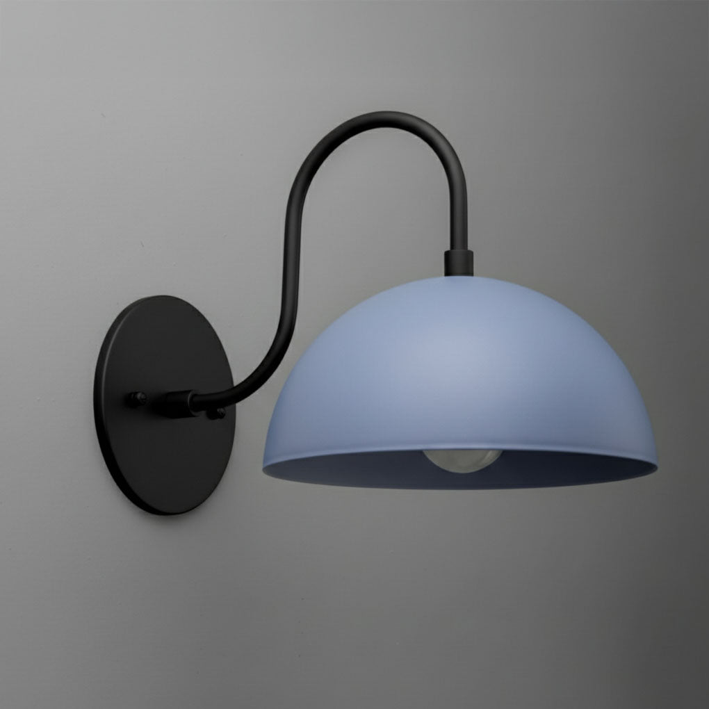 Wall sconce with black metal arm and round periwinkle dome shade mounted on gray wall. - SCONCE MODEL NO. 9092