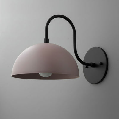 Wall-mounted dome sconce with matte mauve shade and black curved metal arm and base plate. - SCONCE MODEL NO. 9092