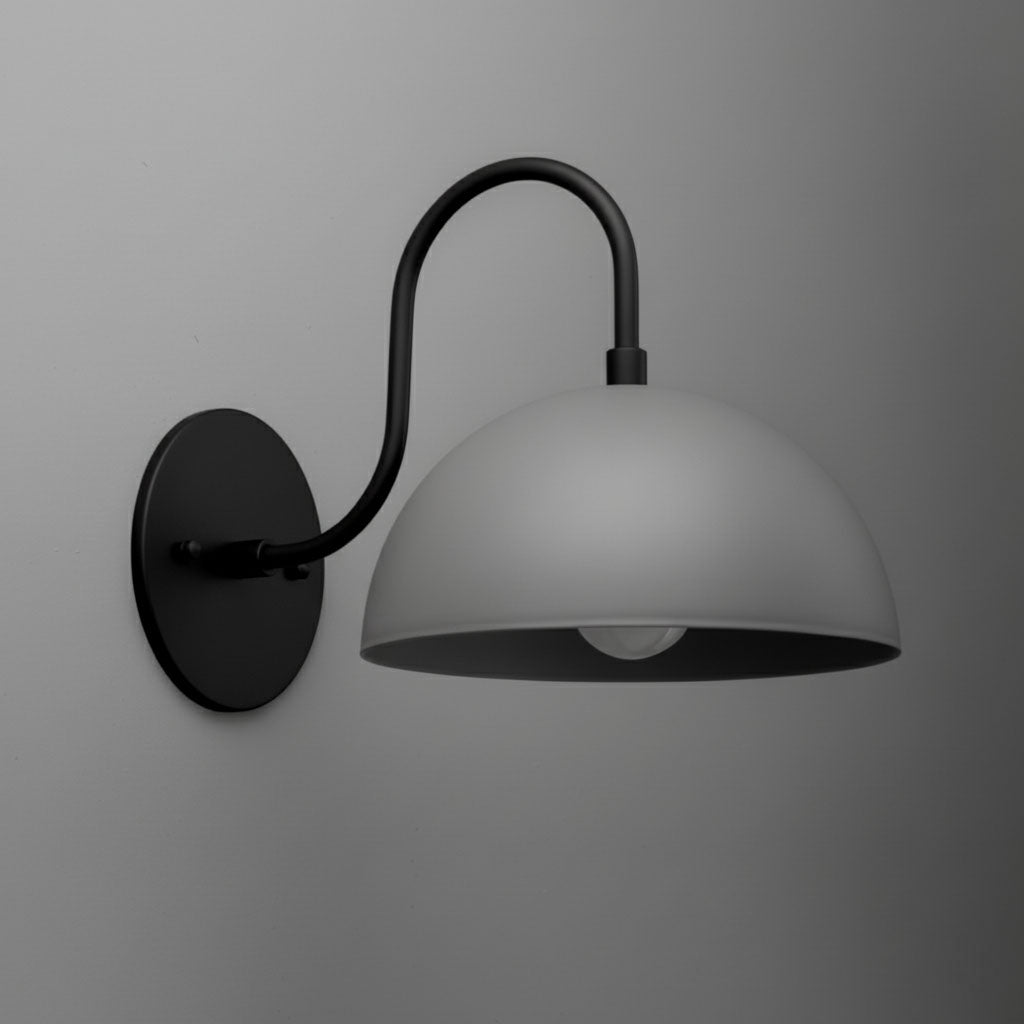 Black metal wall sconce with curved arm and matte gray dome shade. - SCONCE MODEL NO. 9092