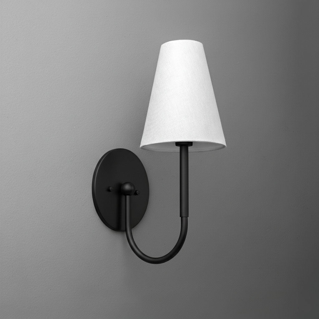 Black metal wall sconce with curved arm and white tapered fabric lampshade. - SCONCE MODEL NO. 4594