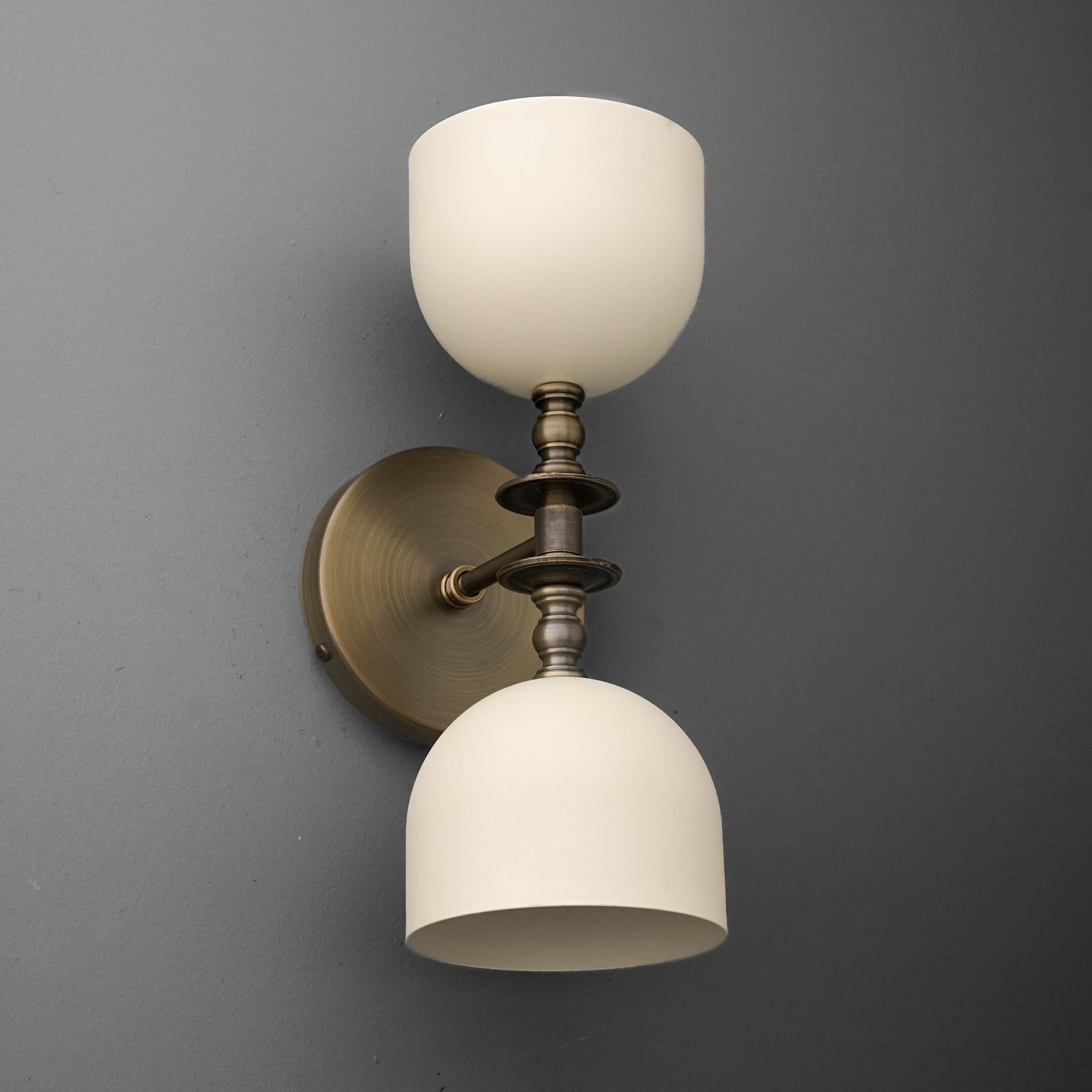 Two-bulb wall sconce with brushed brass finish and frosted white glass shades, modern design. - SCONCE MODEL NO. 6995