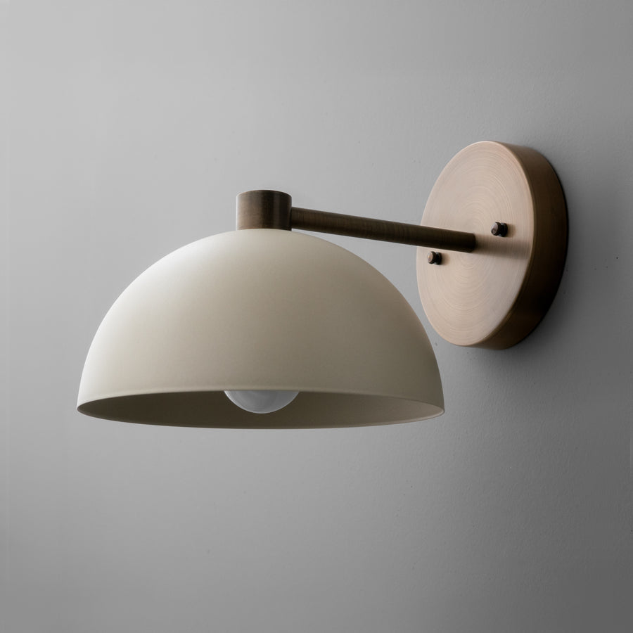 Black metal wall sconce with cream dome shade and round wooden backplate. - SCONCE MODEL NO. 2946