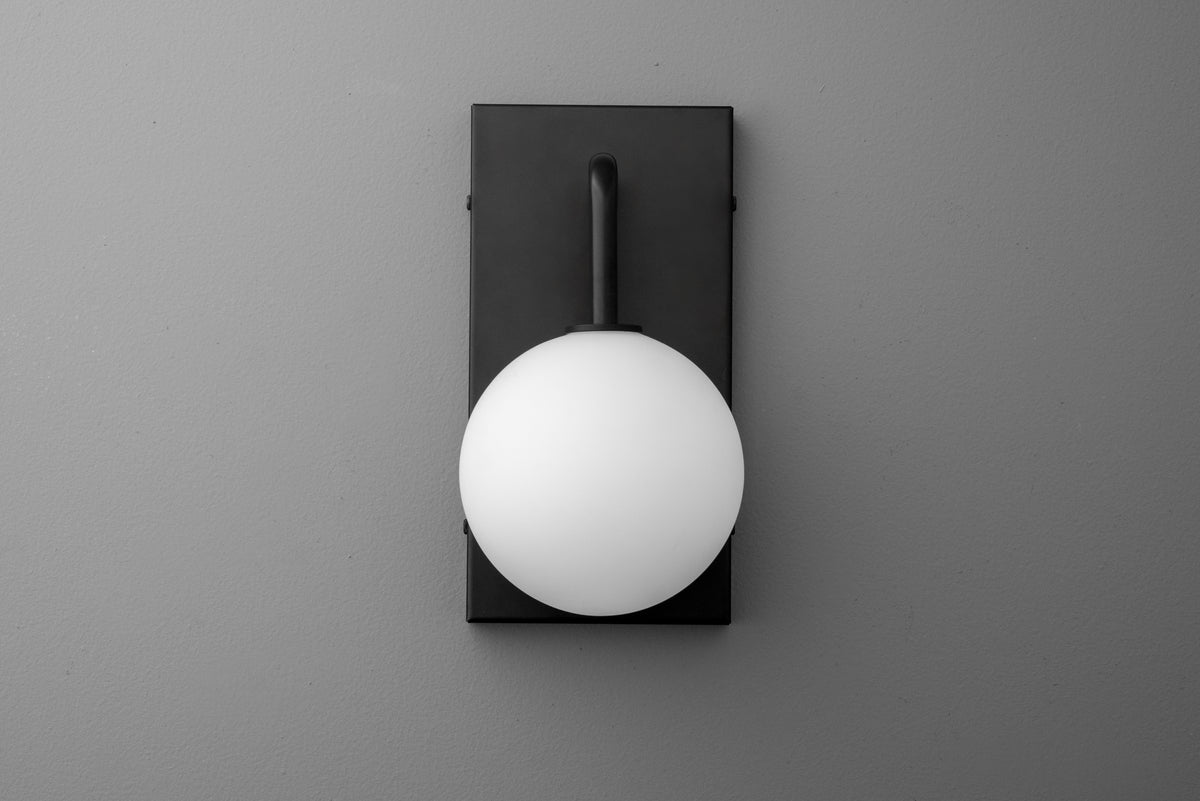 Black rectangular metal wall sconce with frosted white globe light shade. - SCONCE MODEL NO. 9002