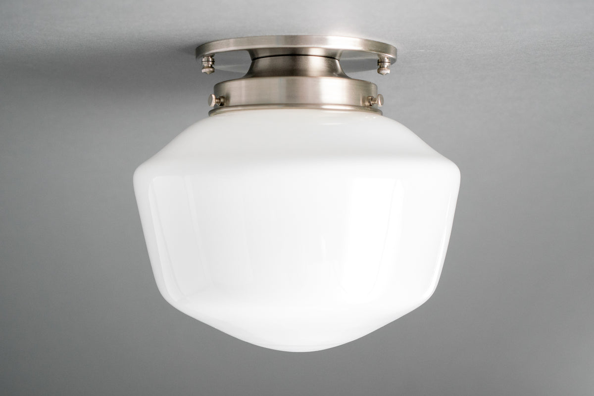 Flush mount ceiling light in Brushed Nickel holding an opal glass schoolhouse shade. - CEILING LIGHT MODEL NO. 7149