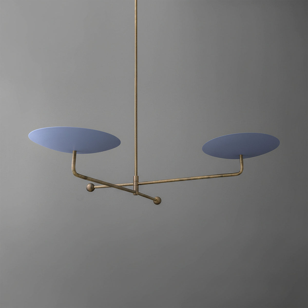 Modern chandelier with two matte blue disc-shaped shades on a thin brass frame suspended from brass rod. - CHANDELIER MODEL NO. 0680