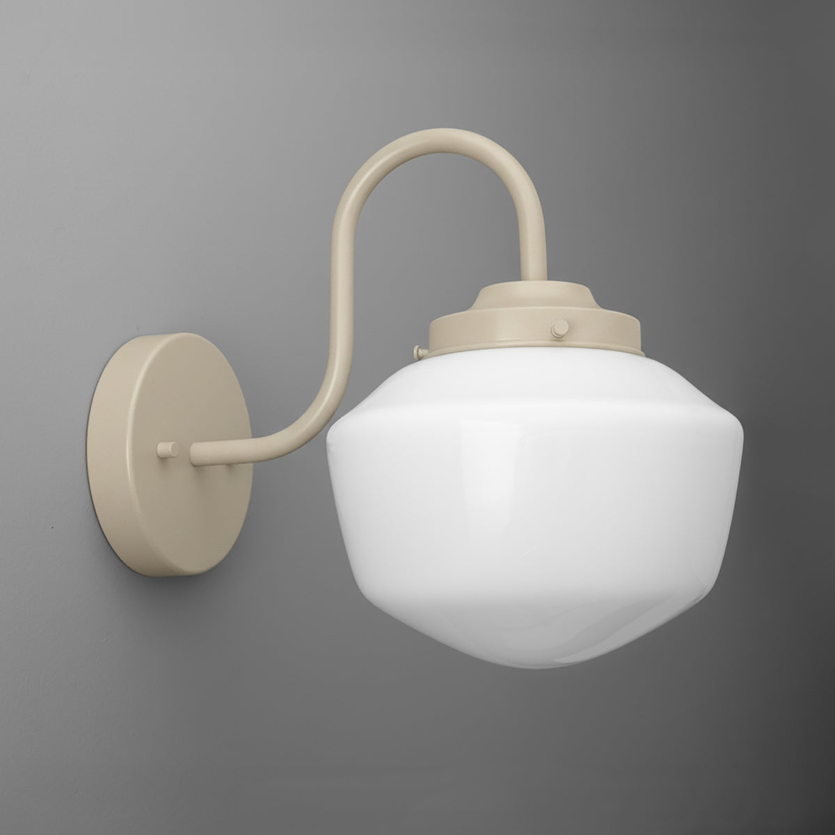 Gooseneck sconce powder coated in Cream with an opal glass schoolhouse shade on a round wall plate. - SCONCE MODEL NO. 5446