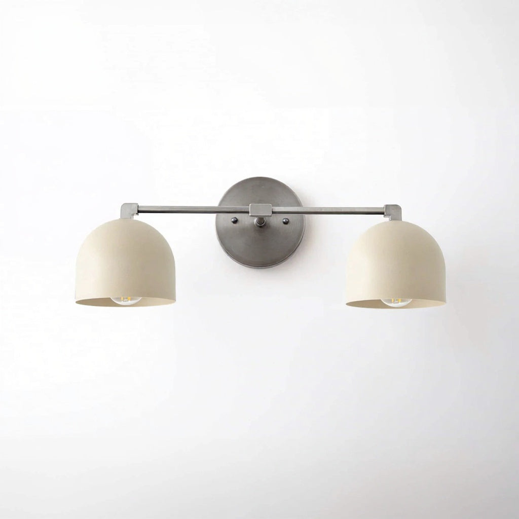 Brushed nickel vanity light with two cream dome shades and minimalist round wall mount. - VANITY LIGHT MODEL NO. 0698