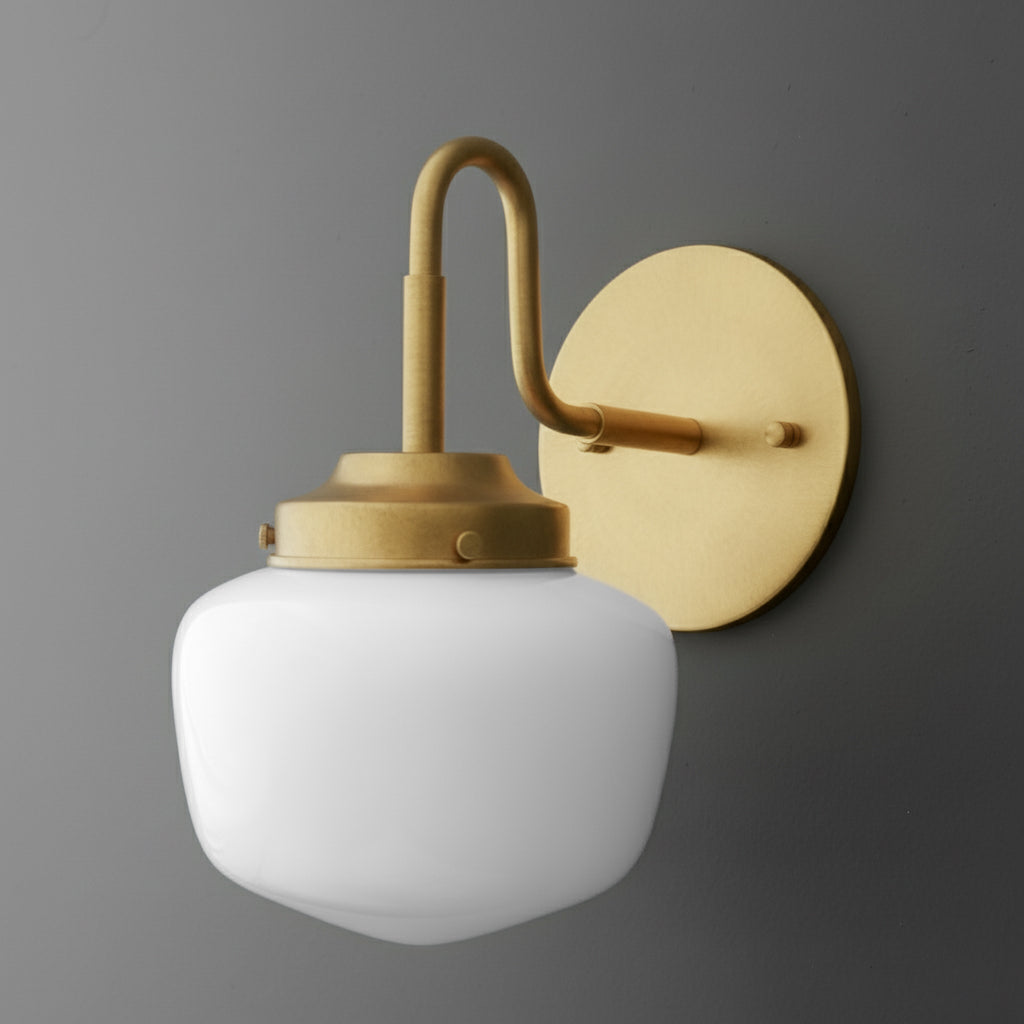 Matte brass 1-bulb wall sconce with curved arm and white opaque glass shade. - SCONCE MODEL NO. 1084