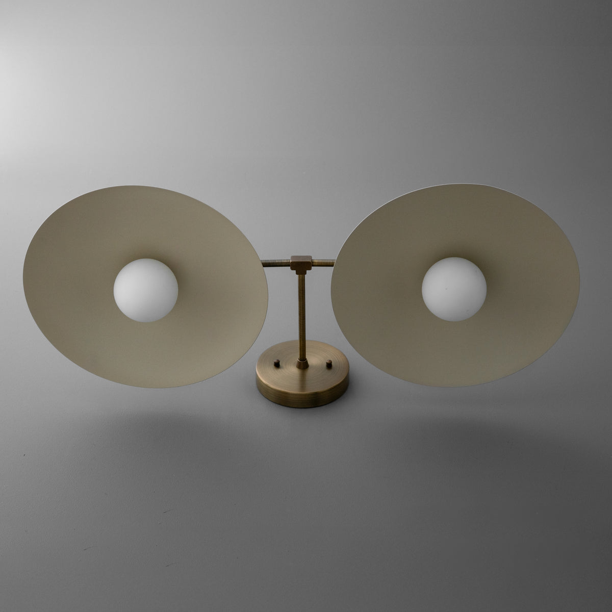 Double-bulb vanity light with round beige metal shades and wooden base. - VANITY LIGHT MODEL NO. 1168