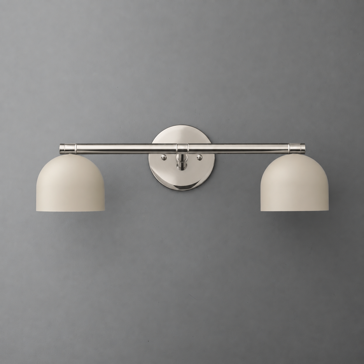 Two-light vanity light in Polished Nickel with Cream steel dome shades hanging from a straight bar on a round wall plate. - VANITY LIGHT MODEL NO. 1186