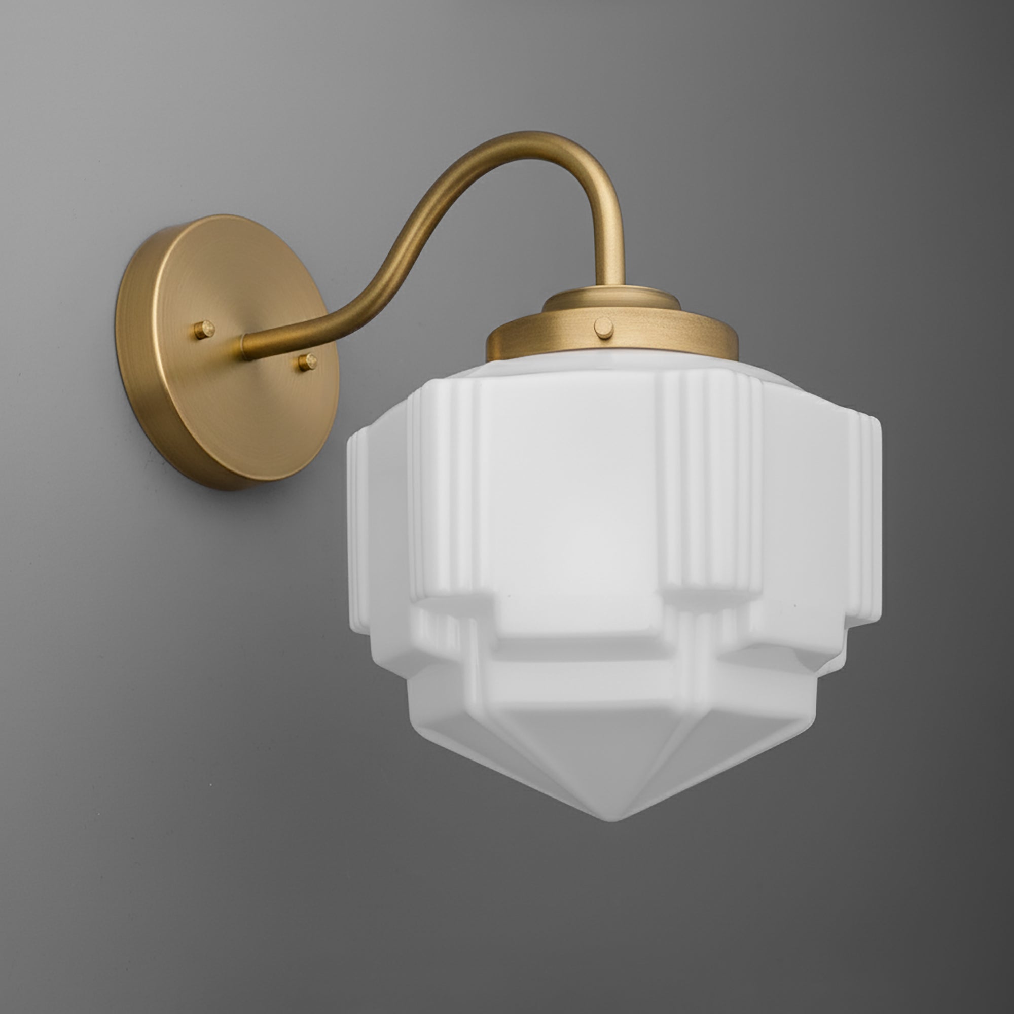 Wall sconce with matte gold-finished curved arm and frosted geometric glass shade. - SCONCE MODEL NO. 1058