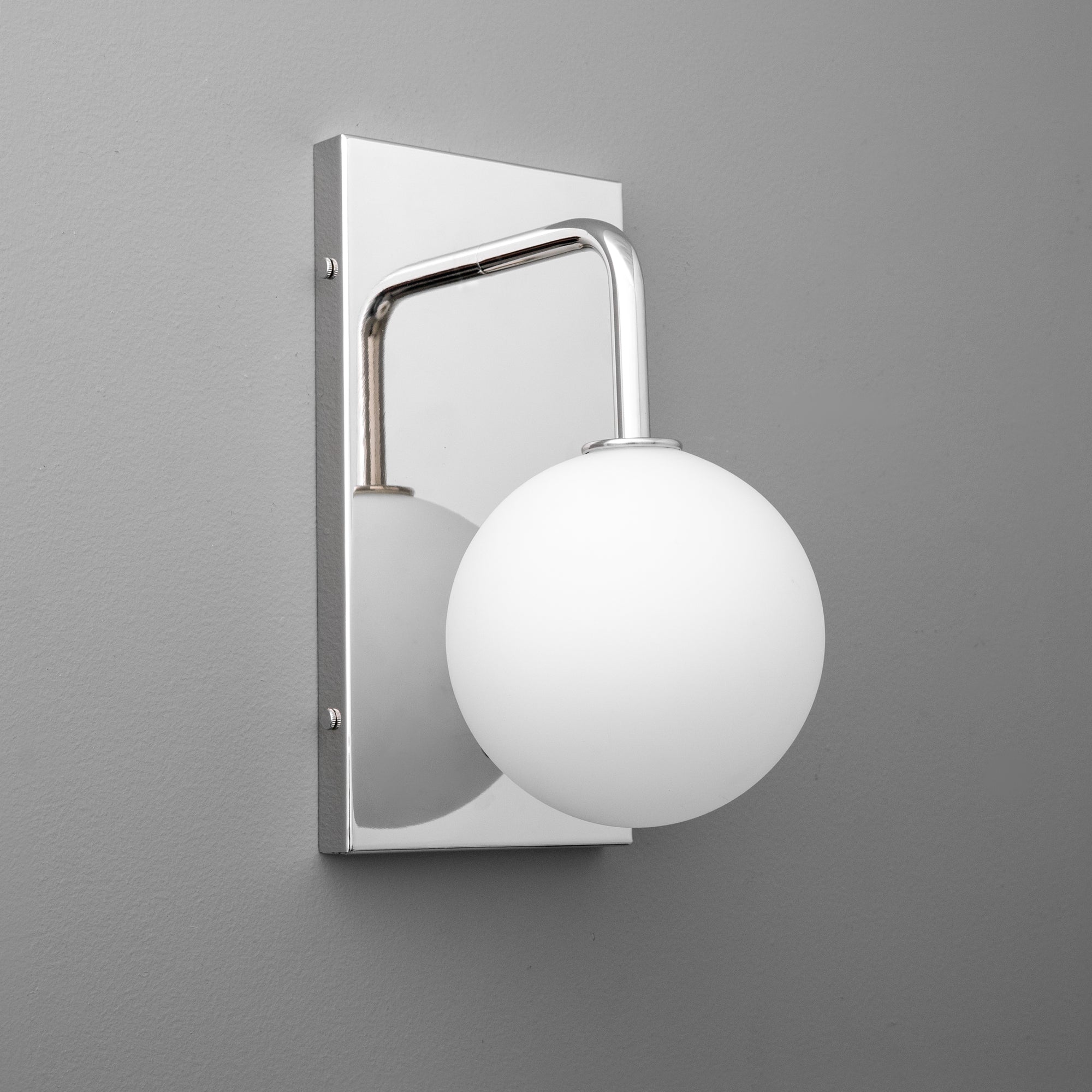 Polished nickel wall sconce with frosted white globe and rectangular backplate. - SCONCE MODEL NO. 9002