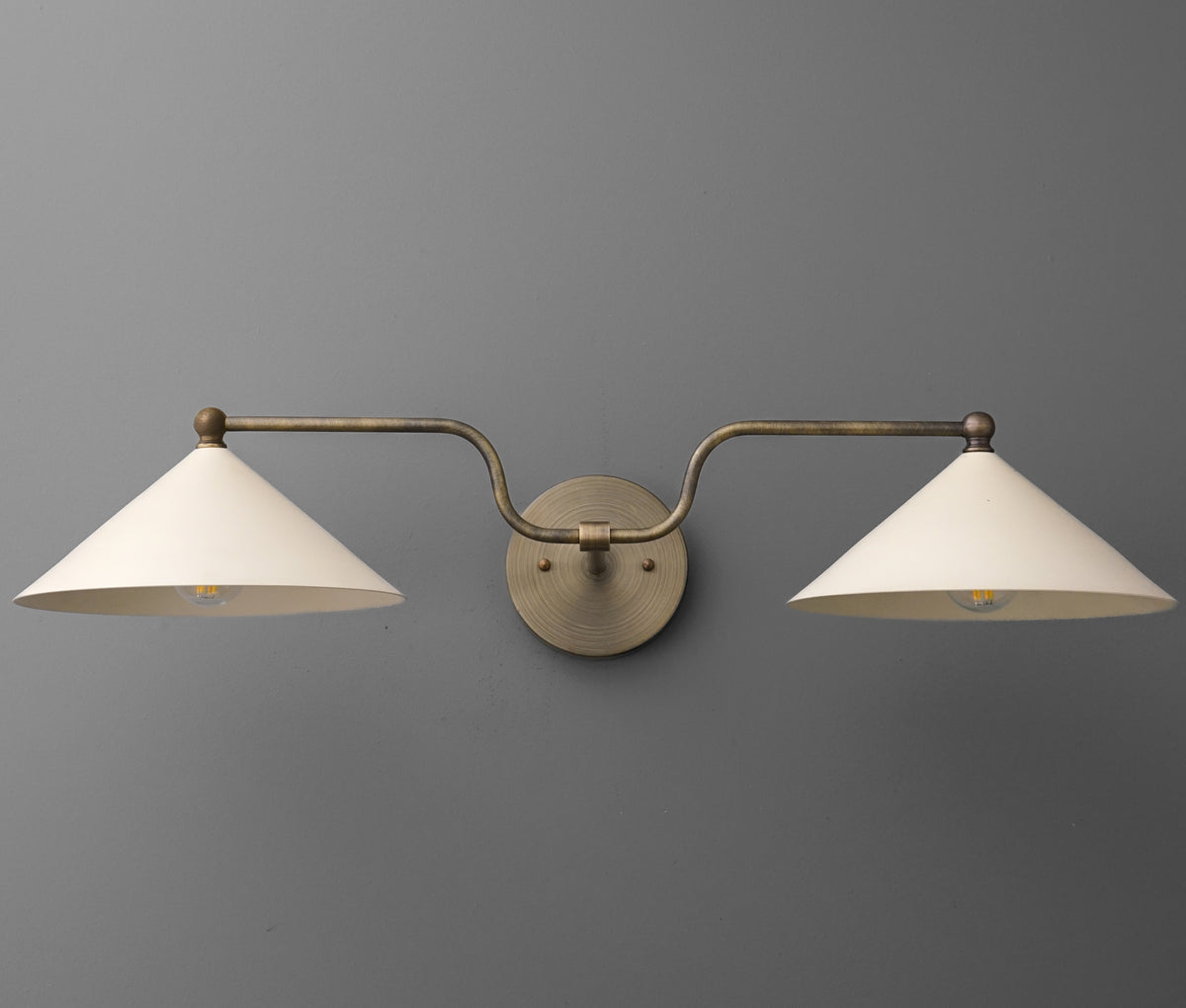 Brushed brass two-bulb vanity light with conical white shades and curved arms. - VANITY LIGHT MODEL NO. 1171