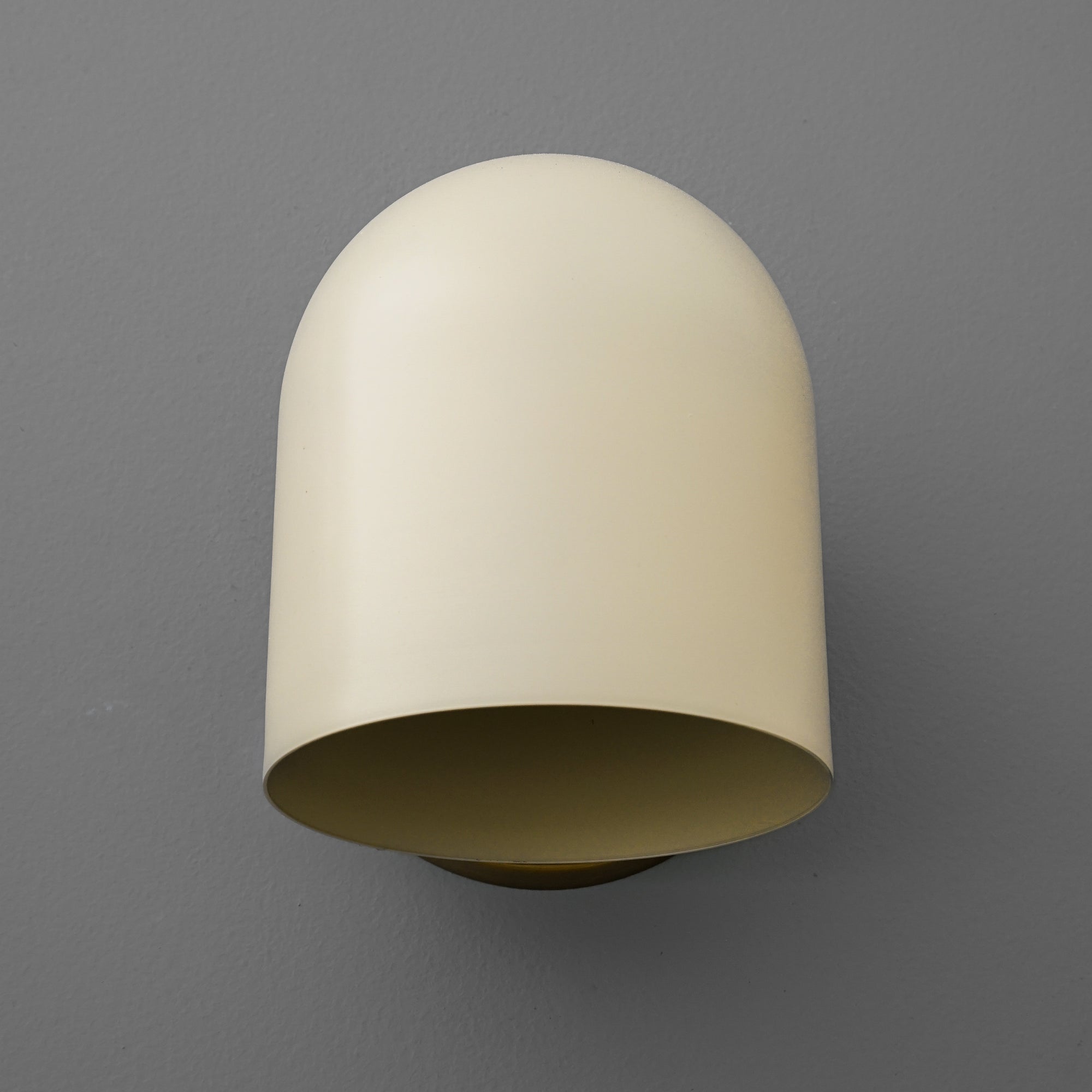 Cream-colored dome-shaped wall sconce with smooth matte finish against gray background. - SCONCE MODEL NO. 2424