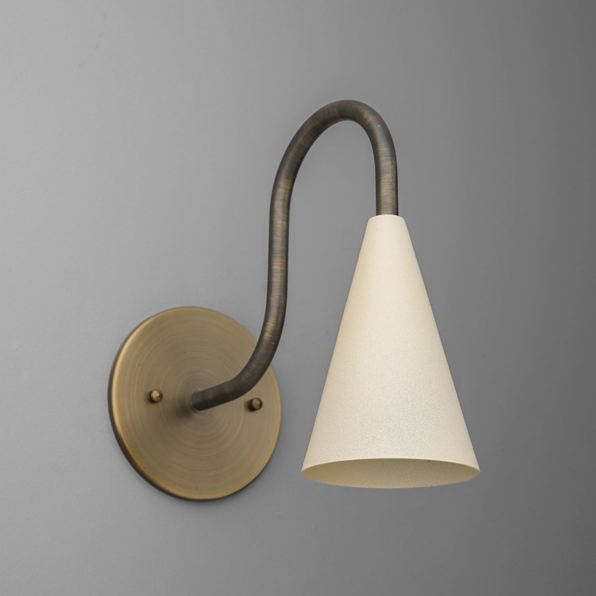 Wall-mounted sconce with a curved metal arm in dark bronze and a matte white conical shade. - SCONCE MODEL NO. 2126