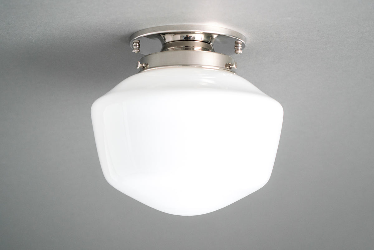 Flush mount ceiling light in Polished Nickel holding an opal glass schoolhouse shade. - CEILING LIGHT MODEL NO. 7149