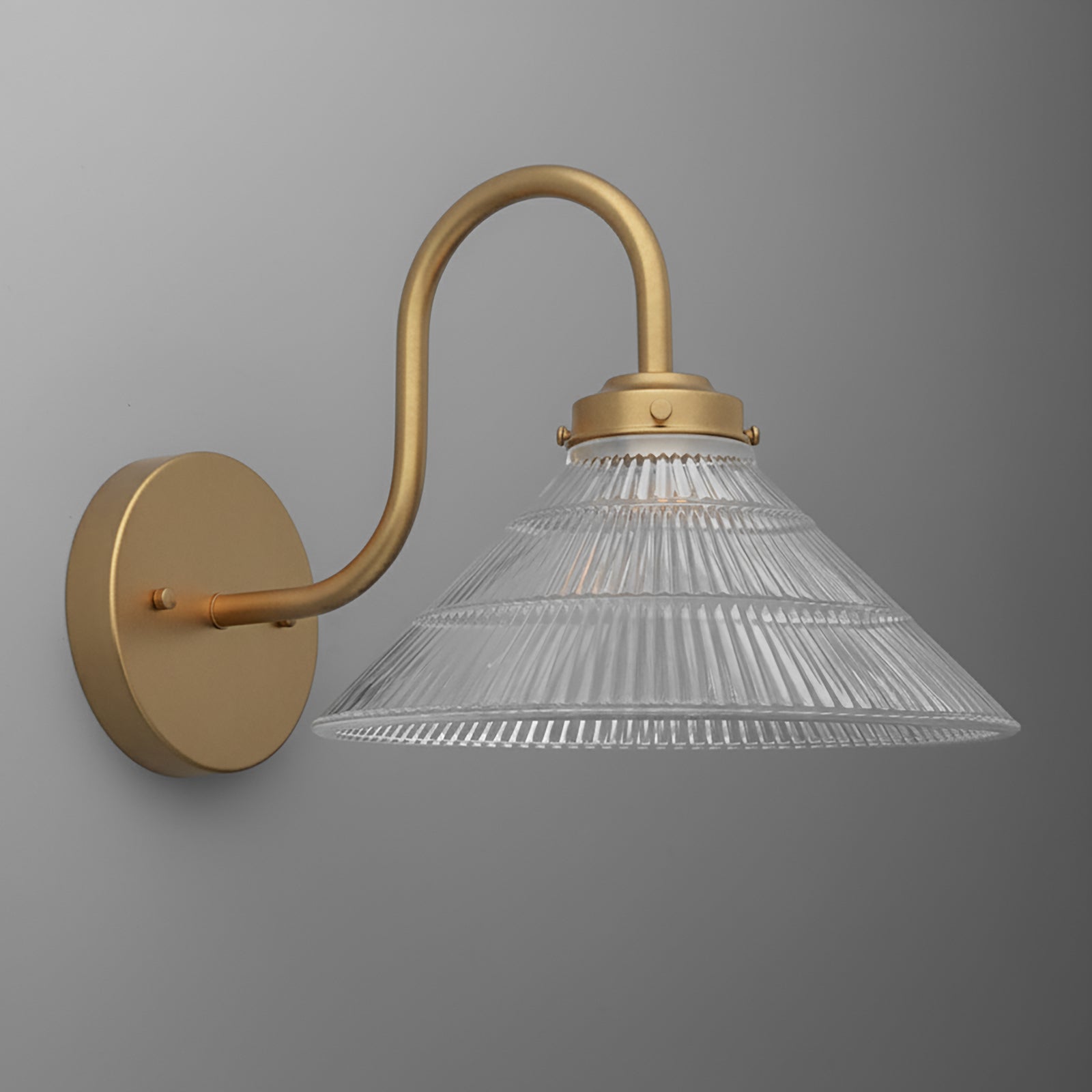 Wall sconce with a curved brass arm and clear ribbed glass conical shade. - SCONCE MODEL NO. 6263