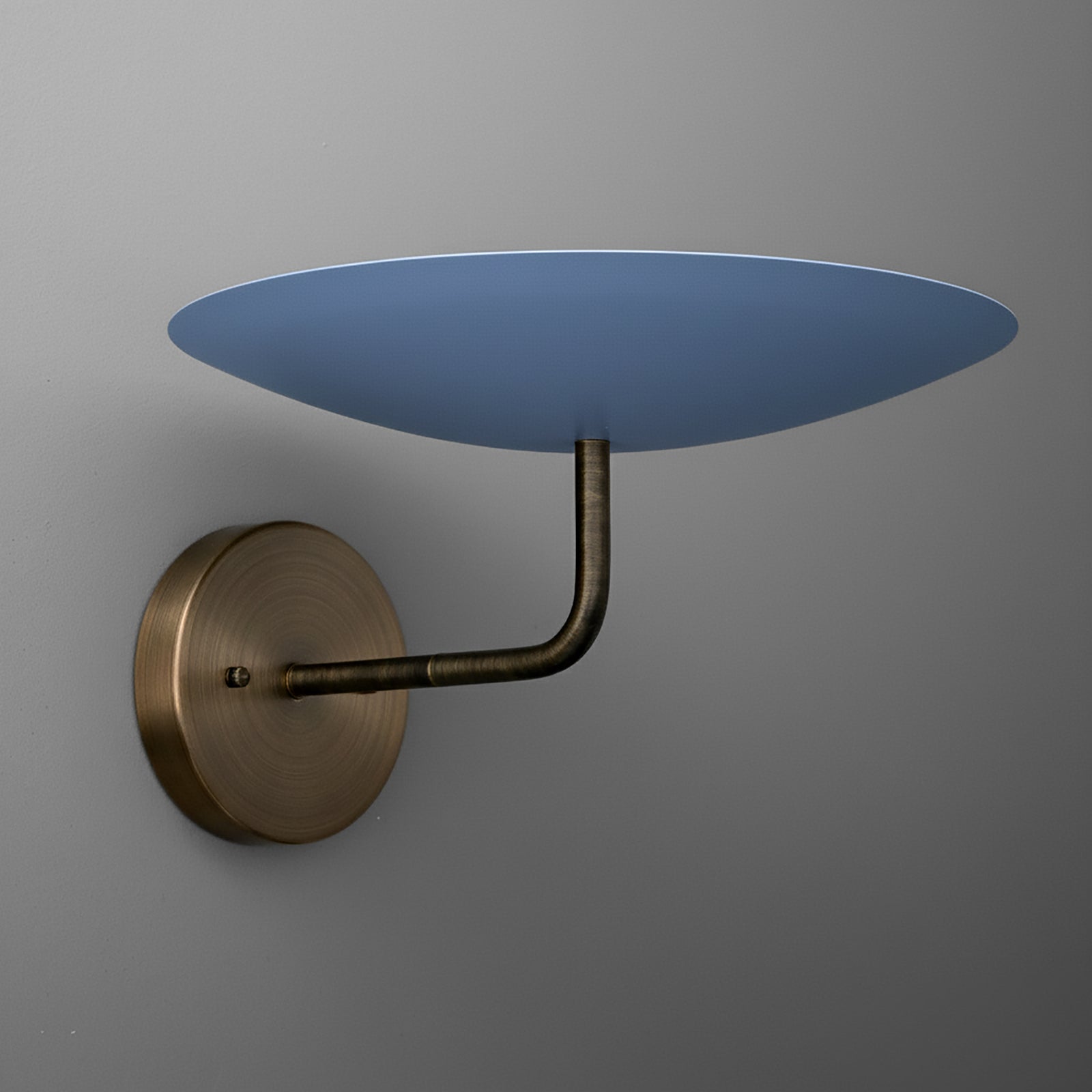Modern wall sconce with antique brass finish and large flat circular blue shade mounted on curved arm. - SCONCE MODEL NO. 1504