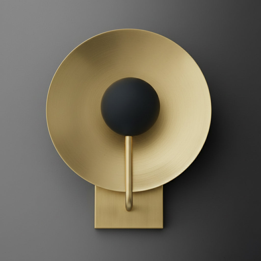 Brushed gold circular metal sconce with matte black bulb holder and rectangular base. - SCONCE MODEL NO. 7858