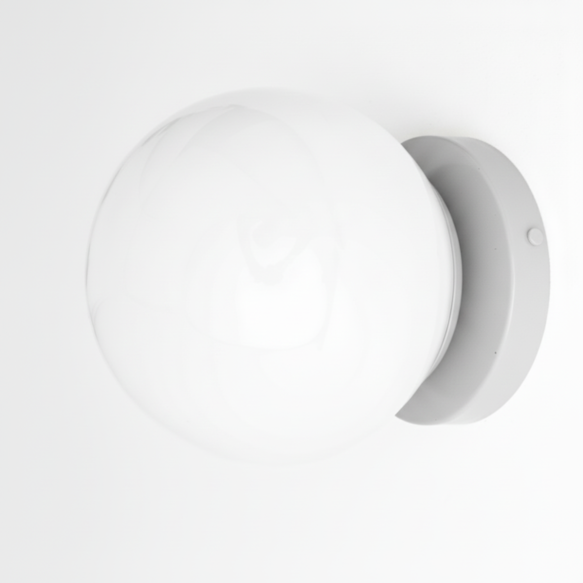 White flush mount globe wall sconce with minimalist round metal base. - SCONCE MODEL NO. 3825