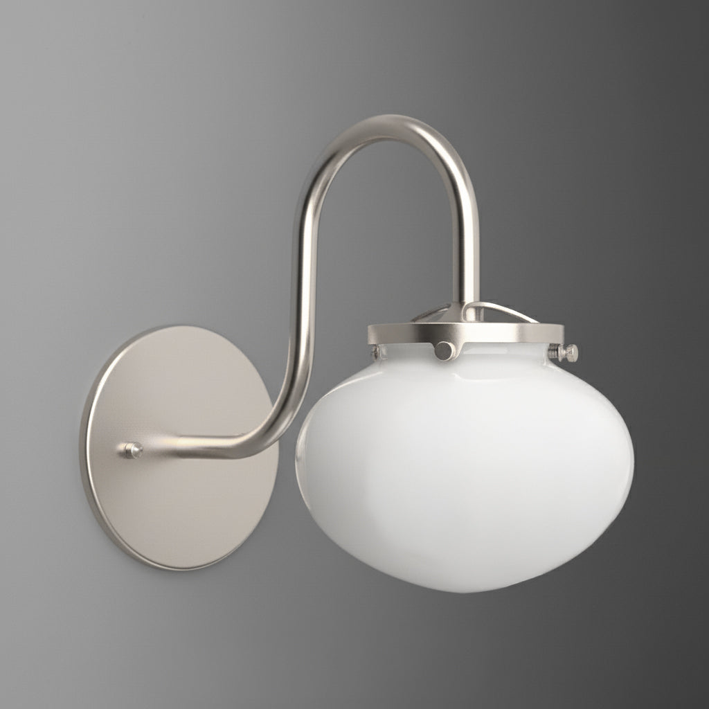 Brushed nickel wall sconce with curved arm and white frosted glass globe shade. - SCONCE MODEL NO. 8563