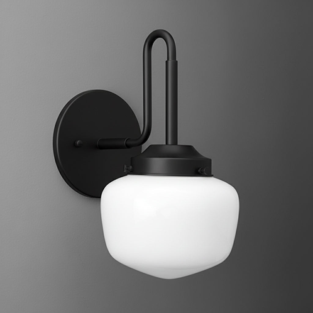 Modern black metal wall sconce with frosted white glass shade and rounded design. - SCONCE MODEL NO. 1020