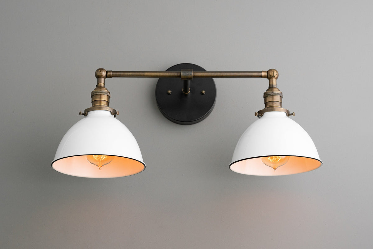 Industrial-style 2-bulb vanity light with black metal base and white dome shades. - VANITY LIGHT MODEL NO. 4564