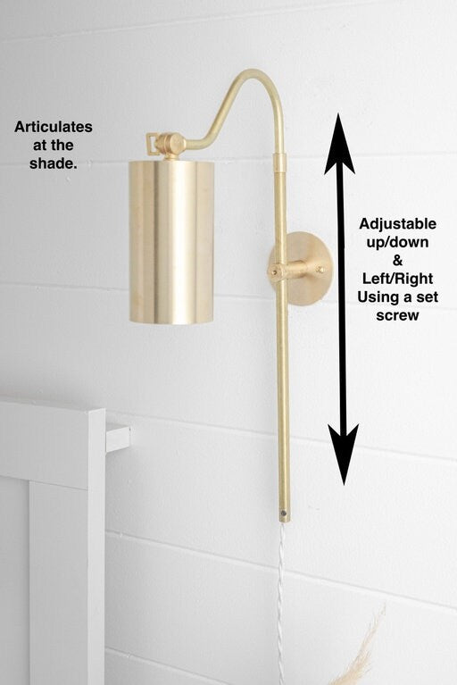 Mid-century modern sealed brass wall sconce with cylindrical shade and adjustable arm. - SCONCE MODEL NO. 1132