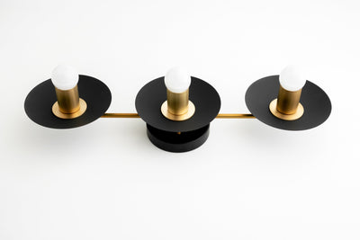 VANITY MODEL No. 2681- Mid Century Modern bathroom lighting with a Black/Brass finish. Designed and produced by MODCREATIONStudio at Peared Creation