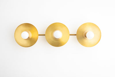 VANITY MODEL No. 2681- Mid Century Modern bathroom lighting with a Raw Brass finish. Designed and produced by MODCREATIONStudio at Peared Creation