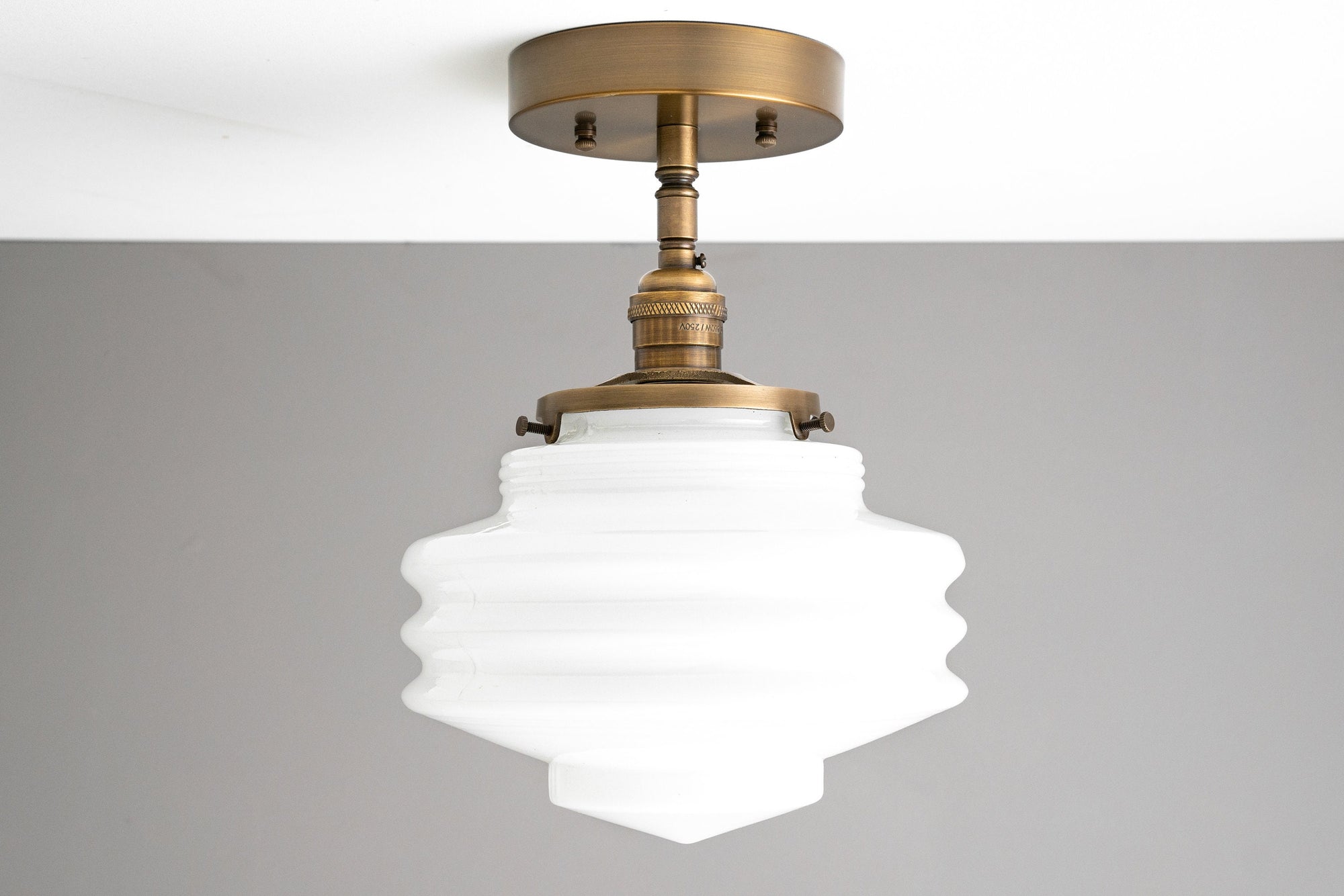 Semi-flush antique brass ceiling light with tiered white glass globe shade. - CEILING LIGHT MODEL NO. 8744